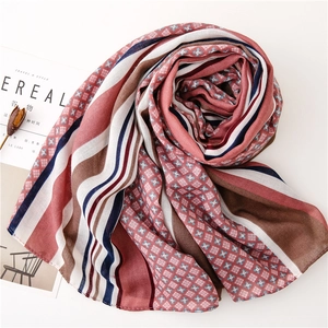 Detail of vintage floral and striped pattern on lightweight cotton linen blend scarf