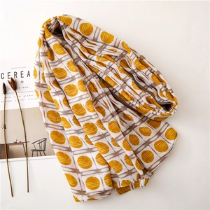 Long chiffon scarf with bright yellow polka dots and light coffee grid patterns