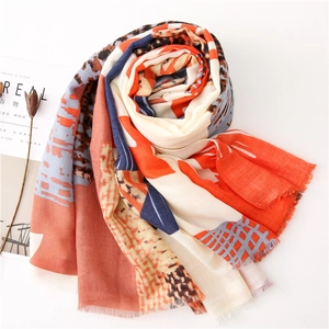 Elegant color block scarf with houndstooth pattern and delicate fringes on white background