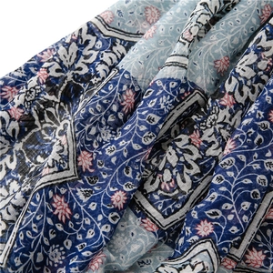Floral print sun protection shawl in light blue and pink, elegant cotton-linen beach scarf