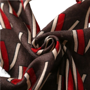 Lightweight striped scarf in brown and red cotton blend with soft textured fabric