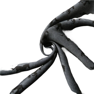 Charcoal grey scarf with black horse silhouette pattern and soft refined texture