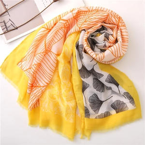 Boho style sun protection scarf with yellow floral ginkgo leaf print and fringe tassels