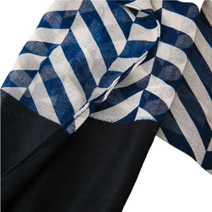 Women's lightweight navy and white striped scarf with geometric herringbone pattern