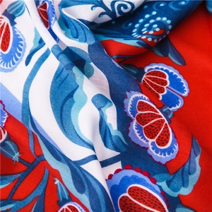 Exotic floral printed cotton linen scarf with tassels and artistic red and blue patterns