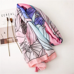 Pink and purple cotton linen scarf with floral print and fringe tassels for beach sun protection