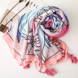 Floral cotton linen scarf with pink tassels and soft pastel flower print for summer