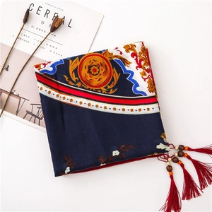 Detail of navy cotton linen scarf featuring vintage peony pattern and wood bead tassels