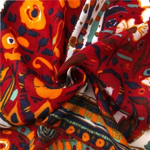 Linen cotton shawl with paisley prints and handmade wooden bead tassels in vibrant red