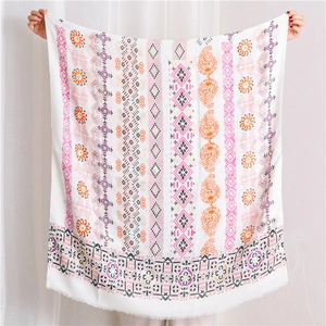 Detailed view of bohemian floral cotton linen shawl with colorful ethnic patterns