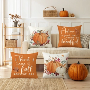 Set of four autumn harvest decorative pillow covers with pumpkin and maple leaf patterns