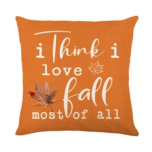 Orange autumn harvest pillow case with I Think I Love Fall Most Of All text and maple leaf