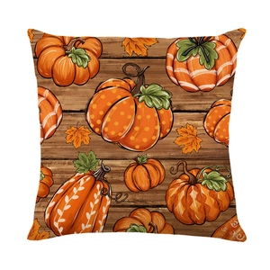 Polyester pumpkin and maple leaf harvest pillow cover with rustic wood texture background