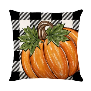 Fodera per cuscino autunnale con zucca e motivo a quadri bianchi e neri