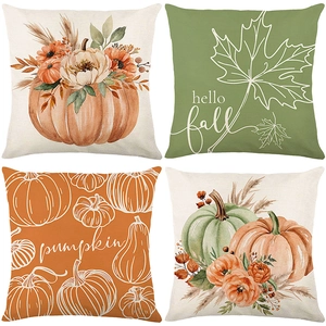 Set of four autumn harvest pillow covers with pumpkin and maple leaf patterns