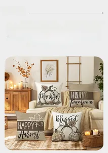 Detailed view of autumn-themed pillow covers with pumpkin and maple leaf prints
