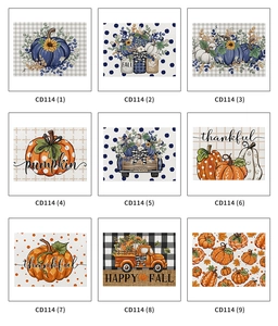 Macro view of nine autumn harvest pumpkin and sunflower prints on cotton linen placemats