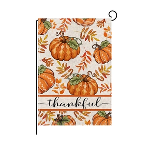 Double-sided polyester garden flag with pumpkins and thankful text on a black metal stand
