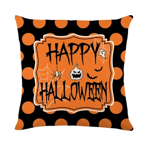 Halloween pillow cover with Happy Halloween print, orange dots, and pumpkin motifs