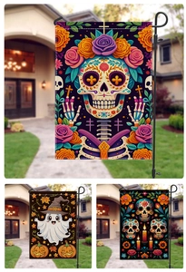 Detail view of Halloween garden flags featuring colorful sugar skulls and cute ghosts