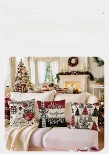 Three festive Christmas pillow covers with holiday prints displayed on a cozy sofa