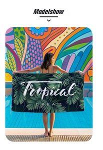 Mikrofaser Strandtuch mit tropischem Palmenmuster und Tropical Dream Textdesign