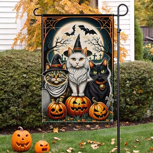 Halloween garden flag featuring wizard cats and glowing pumpkins in autumn outdoor scenery