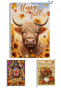 Detail of linen texture on autumn garden flags with highland cow and turkey prints