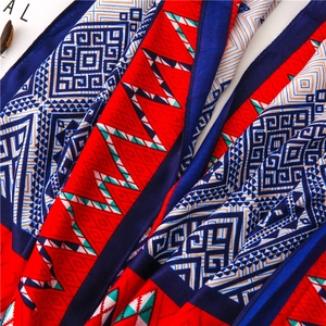 Detail view of retro geometric patterns on a soft summer silk shawl for women
