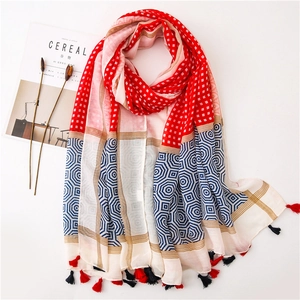 Fashionable geometric patchwork scarf with tassels, checkerboard and octagon patterns