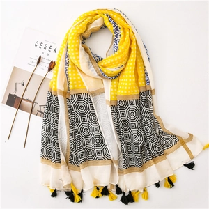 Large color-block patterned scarf in yellow black and beige with fringed tassels