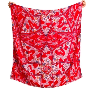 Large red square scarf featuring geometric floral patterns and vibrant symmetric prints