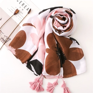 Floral print cotton linen scarf with pink tassels and artistic fringe detail