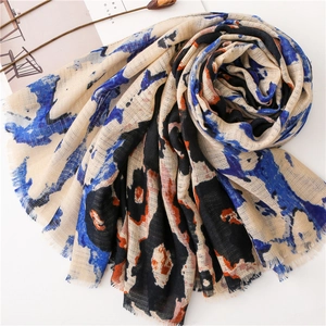Abstract pattern cotton linen scarf with blue and orange ink print and fringe edges