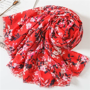 Red cotton linen floral shawl with ethnic print and fringed edges for women