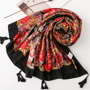 Elegant black floral scarf with red roses and fringe tassels for beach sun protection