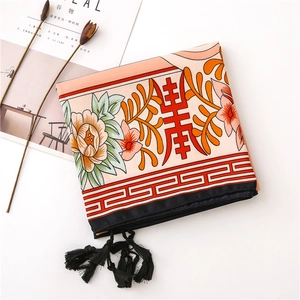 Detail of floral linen scarf with Chinese peony patterns and black tassel edges