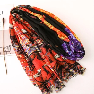 Écharpe artistique en coton et lin avec motifs abstraits colorés et courtes franges