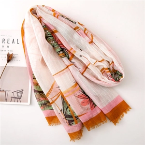 Lightweight floral scarf wrap with fringe tassels and vibrant artistic pattern