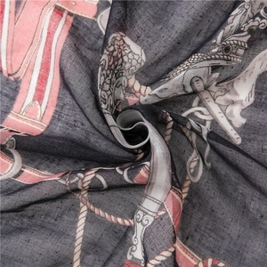 Macro shot of horse harness rope print and delicate texture on light cotton scarf