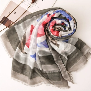 Close-up of British flag print cotton linen scarf with soft fringe edges and texture