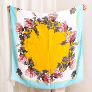 Floral print cotton linen scarf featuring yellow sun center and purple flower patterns
