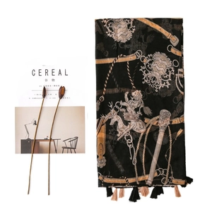 Elegant black silk scarf with golden equestrian patterns and tassels for women