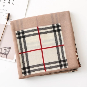 Detailed view of camel plaid cotton linen scarf with soft texture and neat hem