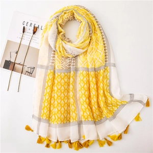 Bohemian yellow linen cotton scarf with geometric prints and tassels for beach sun protection