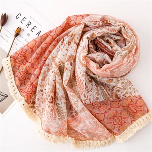 Écharpe en coton lin bohème avec imprimé paisley orange et bordures à glands