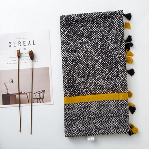 Polka dot and herringbone viscose scarf with yellow accent and tassel fringe details