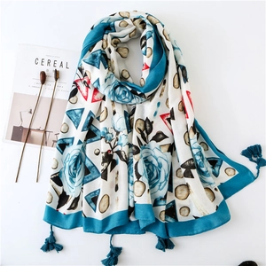 Damen Schal aus Baumwollleinen mit blauen Quasten und floralen geometrischen Mustern