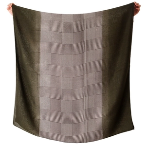 Lightweight houndstooth shawl in olive green and beige with vertical striped pattern