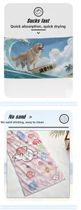 Detail of quick-dry beach towels with cartoon golden retriever and bunny floral prints